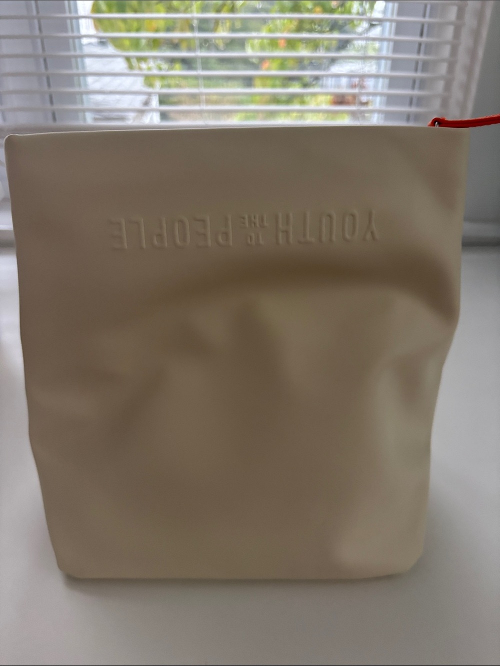 Cream Travel Pouch